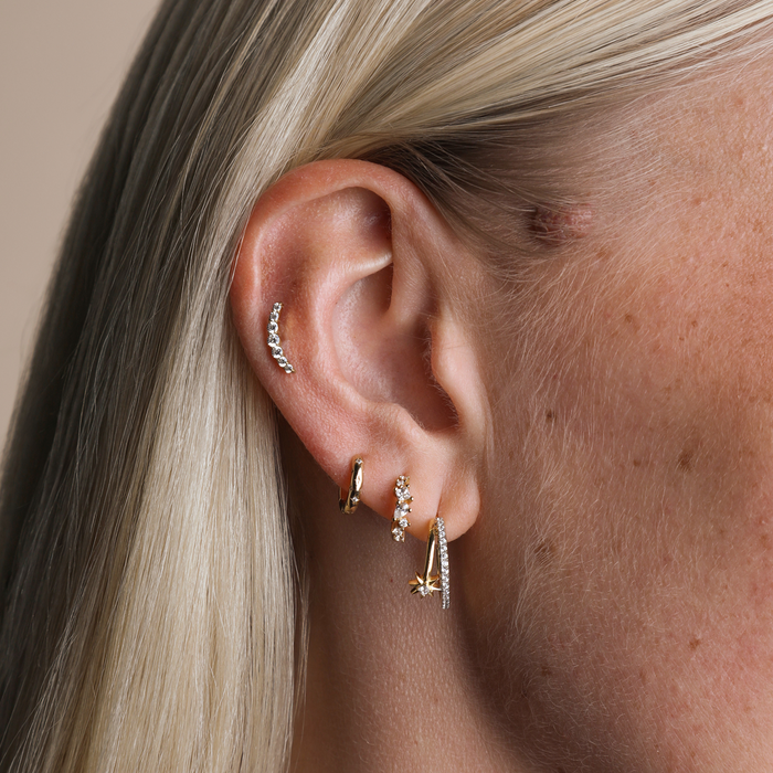 Helix worn shot gold piercing jewellery