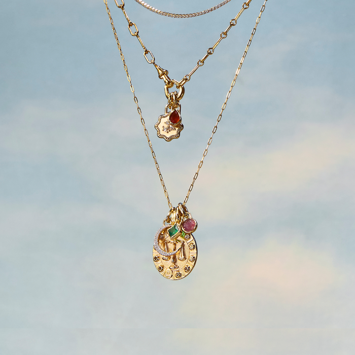 Three zodiac star sign necklaces from Astrid & Miyu's constellation jewellery collection