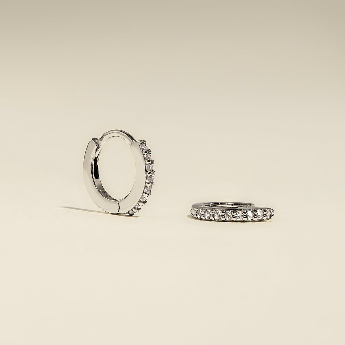 April Birthstone Huggies in Silver with White CZ