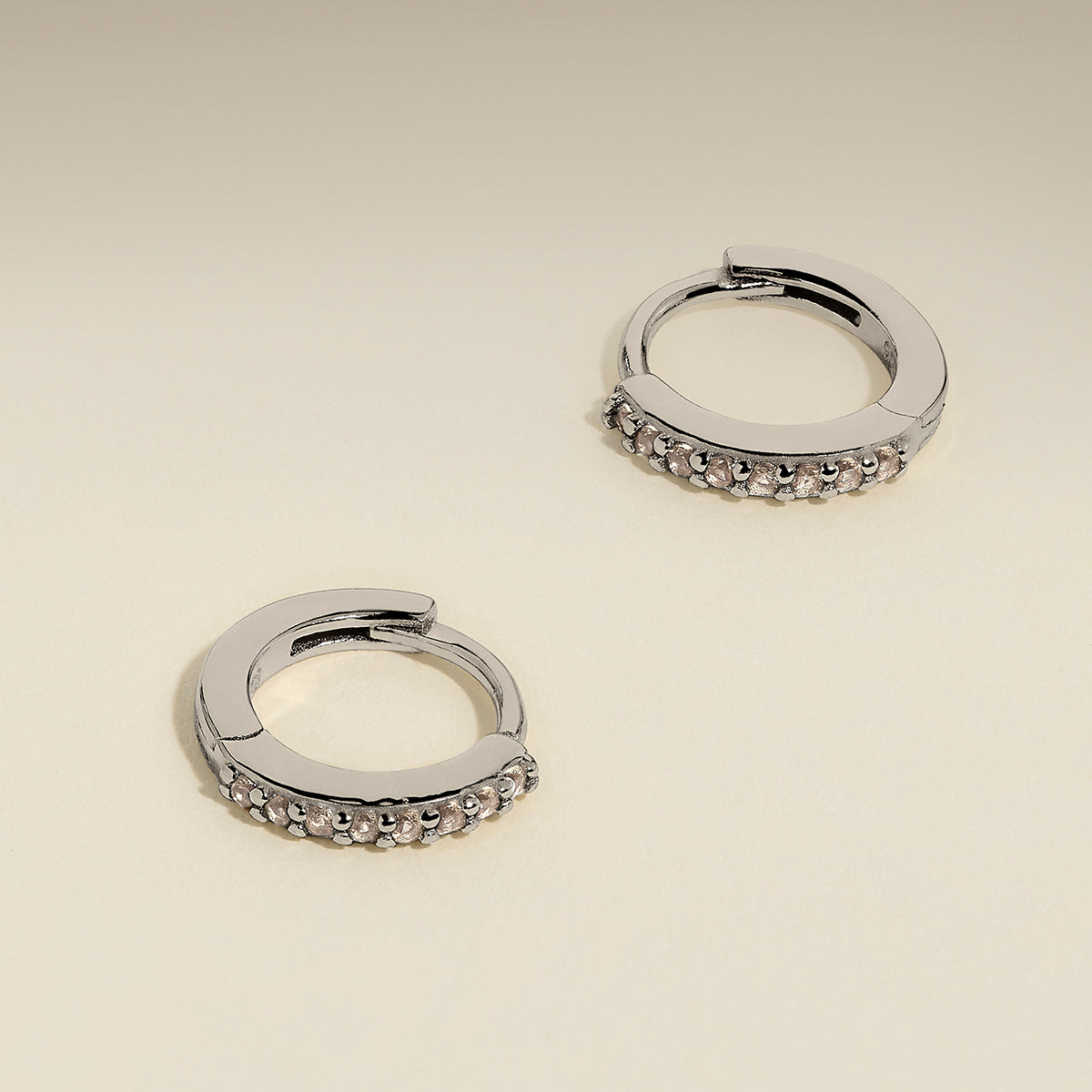 April Birthstone Huggies in Silver with White CZ