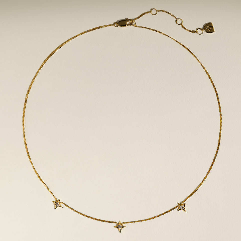 Cosmic Star Charm Necklace in Gold