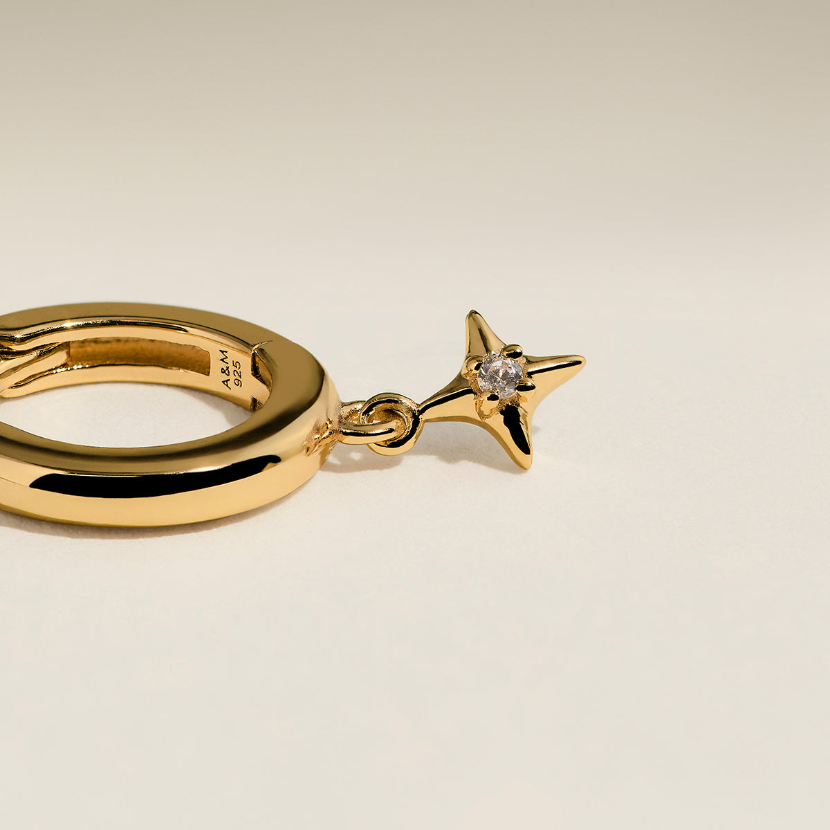 Cosmic Star Charm Huggies in Gold