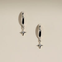 Cosmic Star Charm Huggies in Silver