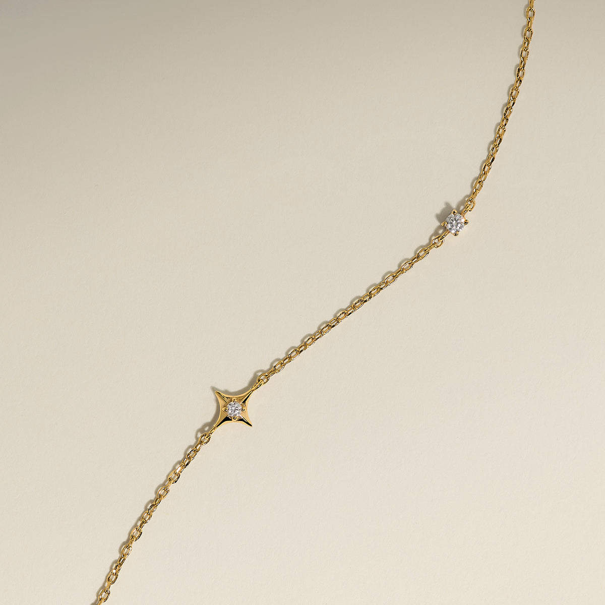 Cosmic Star Charm Bracelet in Gold