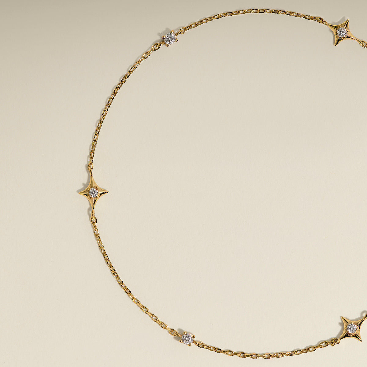 Cosmic Star Charm Bracelet in Gold