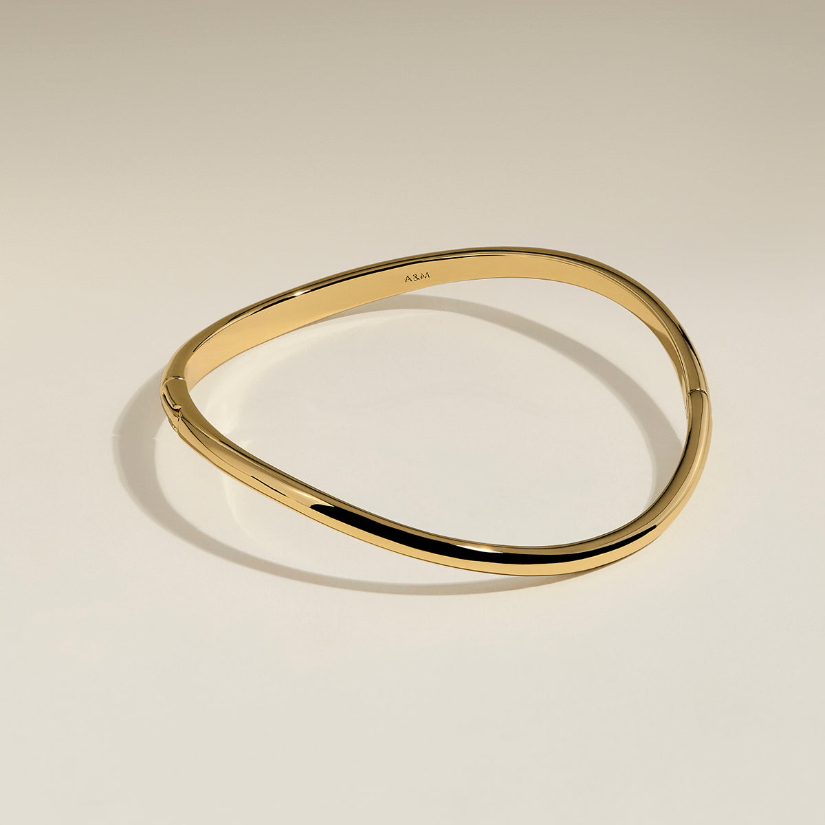 Wave Bangle in Gold-Astrid & Miyu
