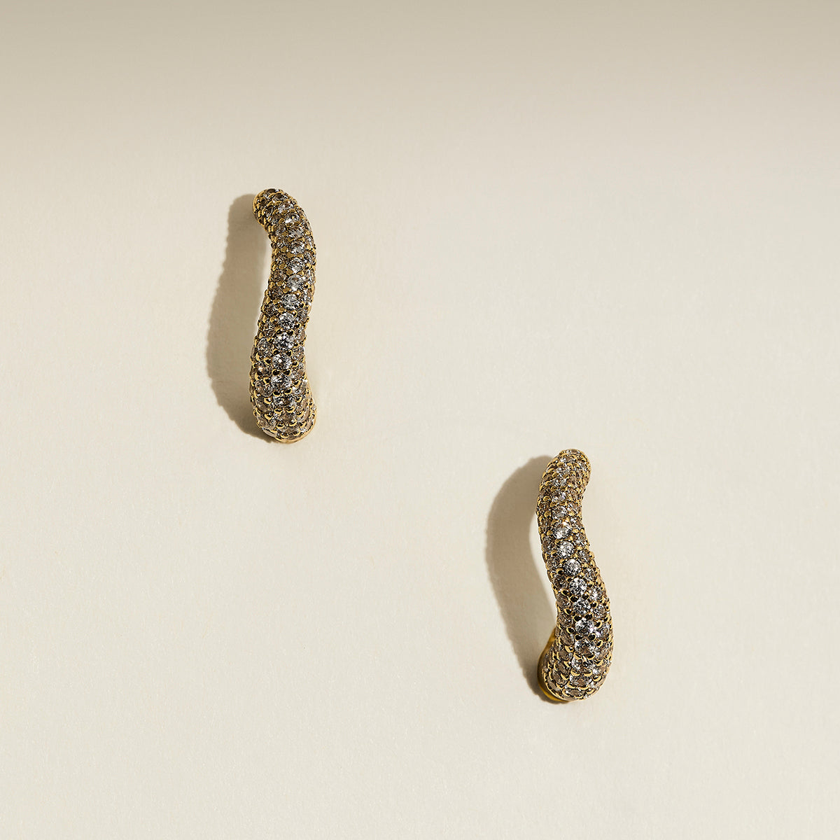 Wave Pavé Crystal Hoops in Gold