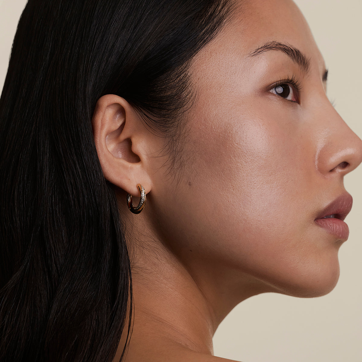 Crystal Cosmic Twist Medium Hoops in Gold-Astrid & Miyu