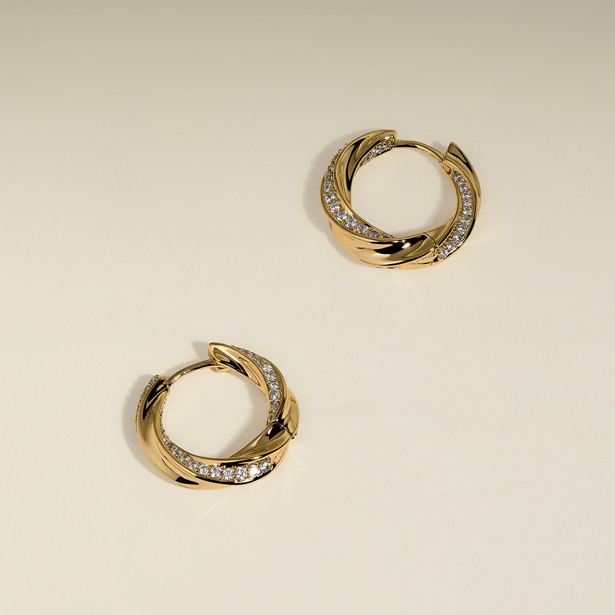 Crystal Cosmic Twist Medium Hoops in Gold-Astrid & Miyu