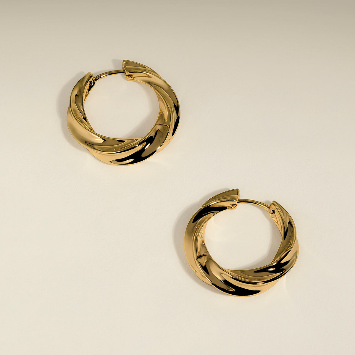 Cosmic Twist Large Hoops in Gold-Astrid & Miyu