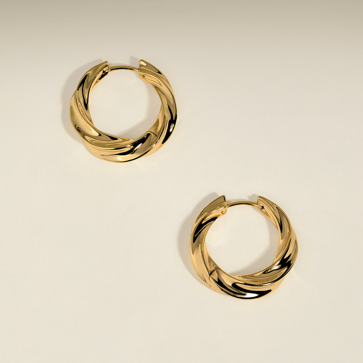 Cosmic Twist Large Hoops in Gold-Astrid & Miyu