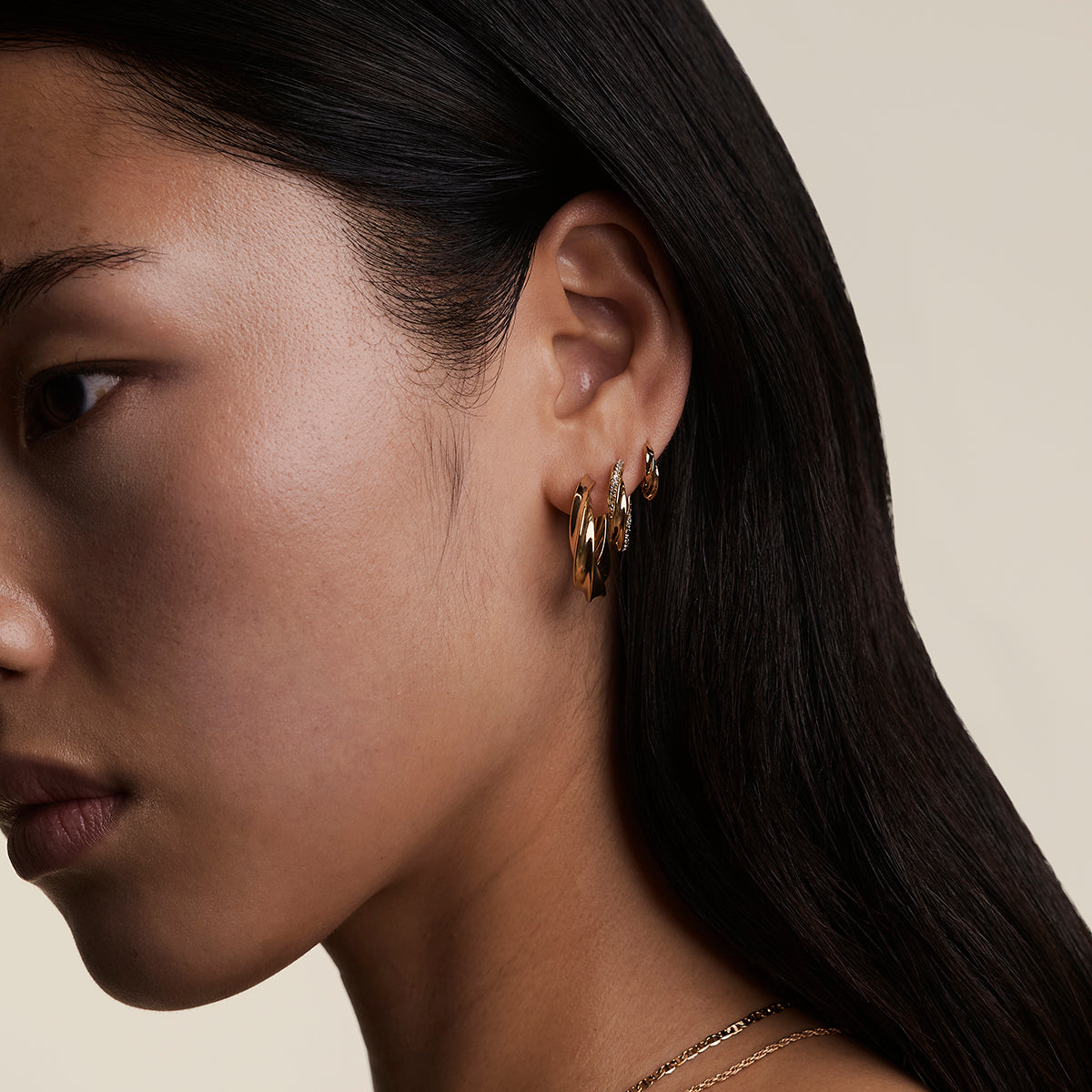 Cosmic Twist Huggies in Gold-Astrid & Miyu