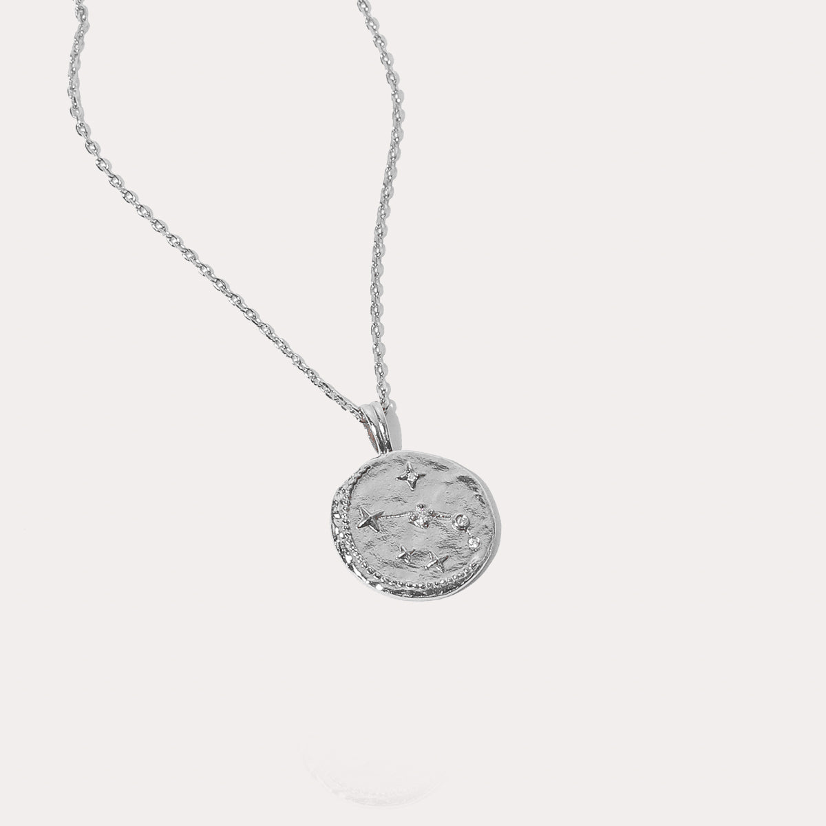 Close up shot of the front of the Aries Zodiac Pendant Necklace in Silver