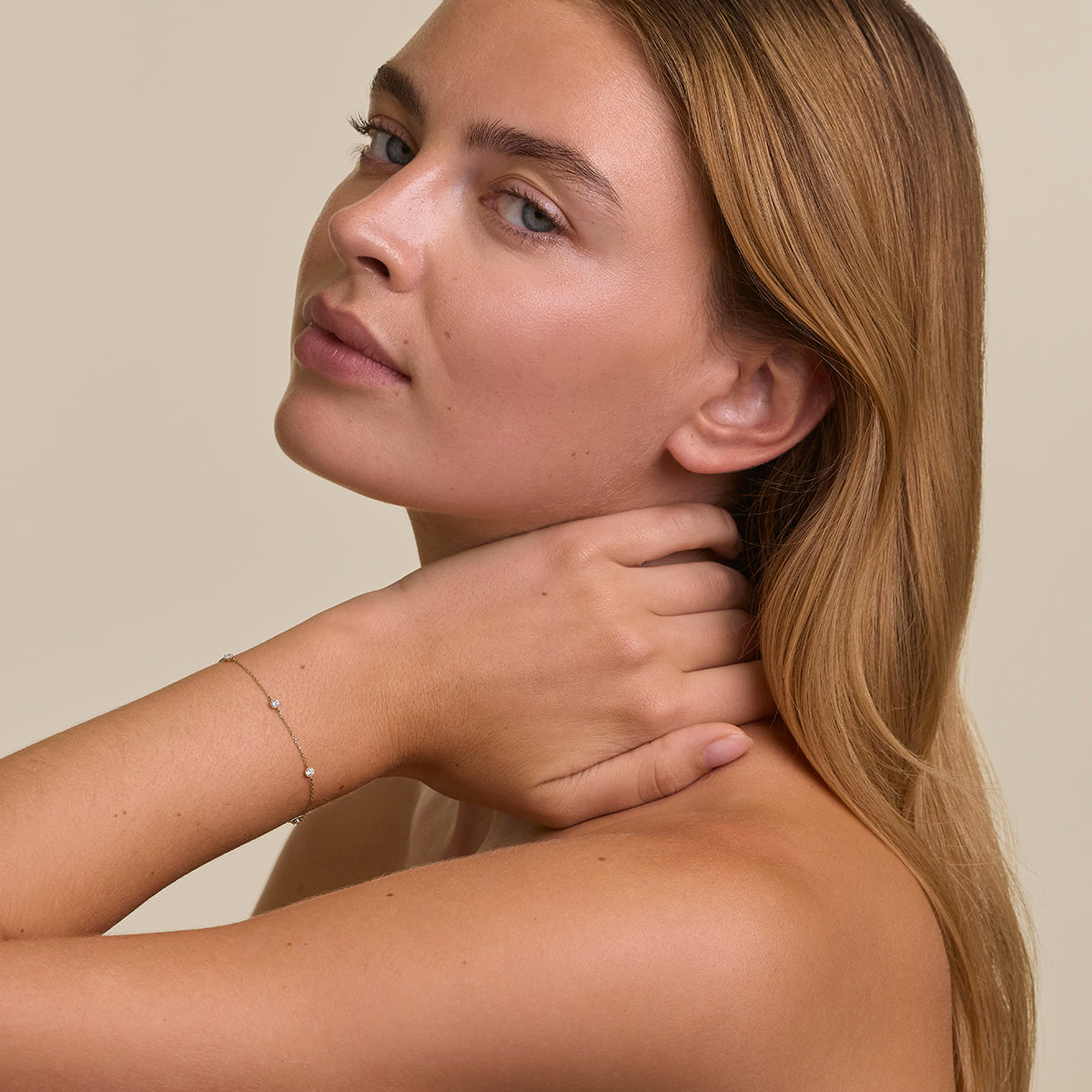 Floating Diamond Charm Bracelet in Solid Gold