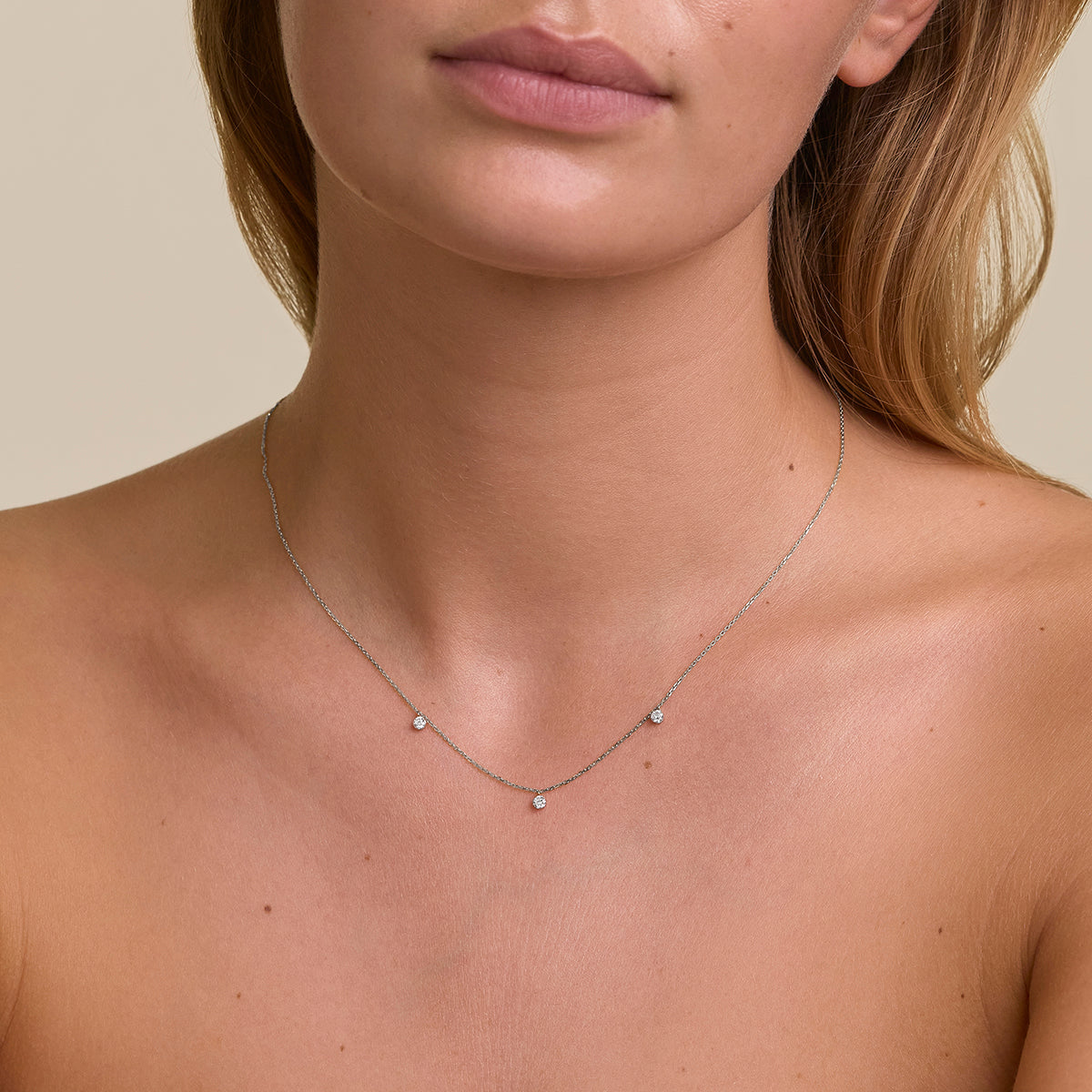 Floating Diamond Charm Bracelet in Solid White Gold