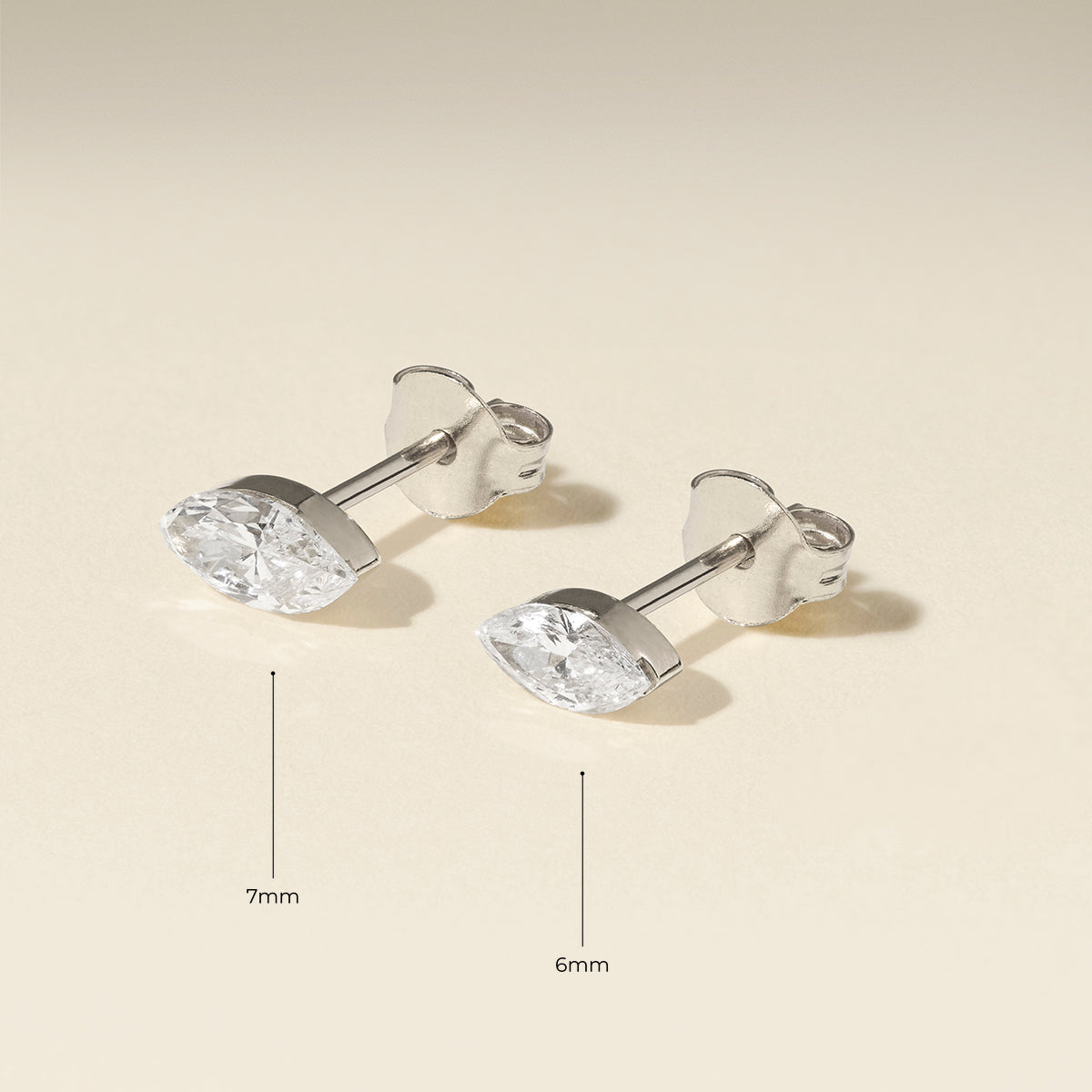 Floating Marquise Diamond Stud Earrings in Solid White Gold