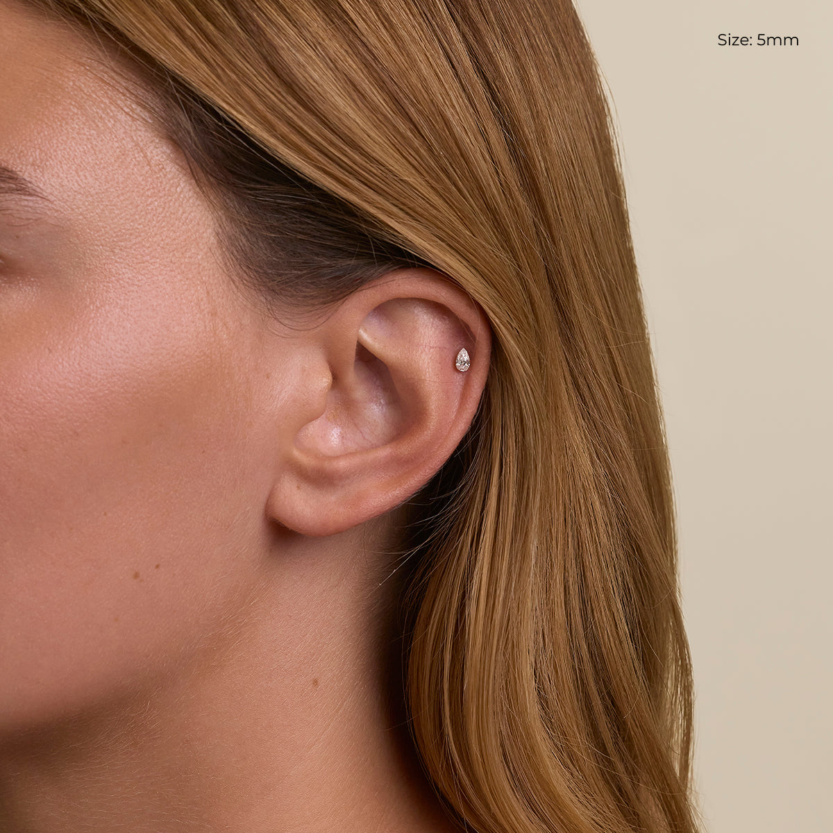 Floating Pear Diamond Stud Earrings in Solid Gold