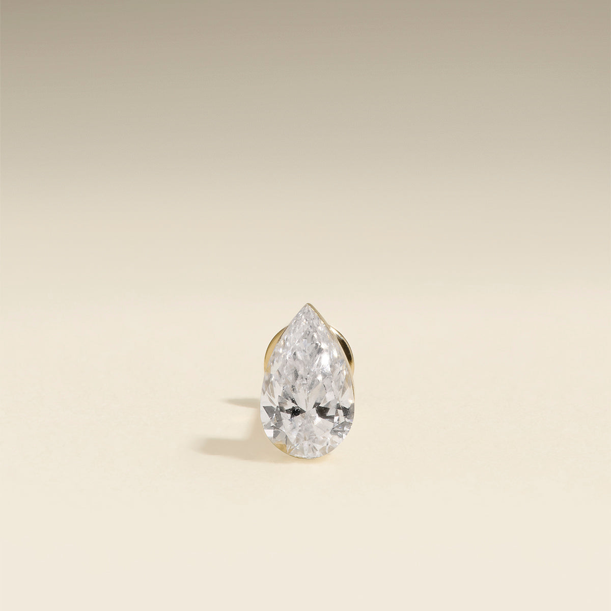 Floating Pear Diamond Piercing Stud in Solid Gold