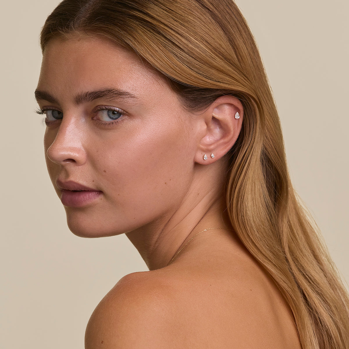 Floating Pear Diamond Piercing Stud in Solid Gold