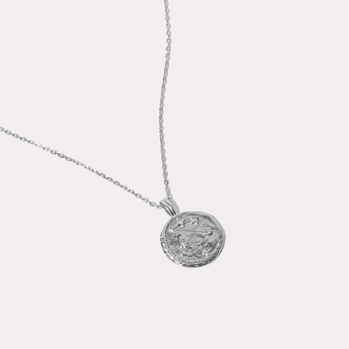 Close up shot of the front of the Libra Zodiac Pendant Necklace in Silver
