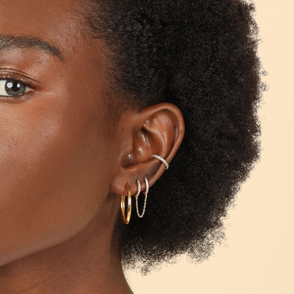 Chain Link Huggie in Gold worn