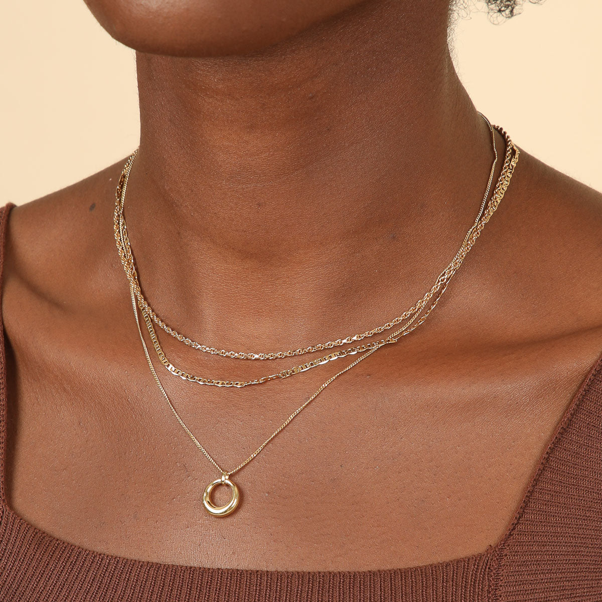 Bold Halo Pendant Necklace in Gold worn layered with necklaces