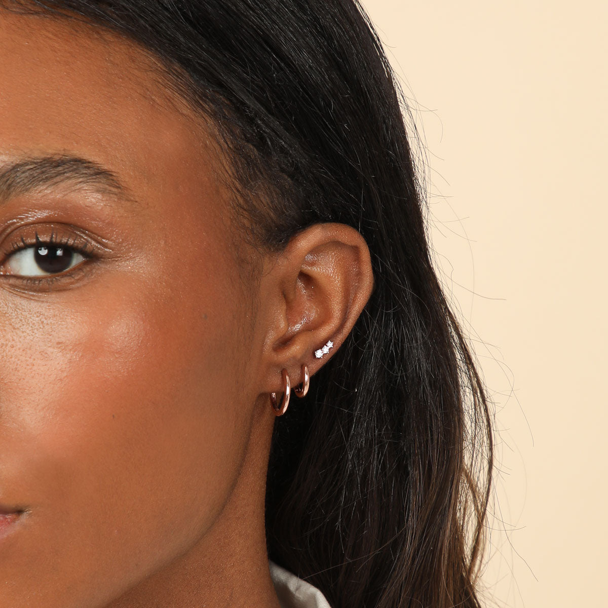 Glimmer Crystal Climber Stud Earrings in Rose Gold worn