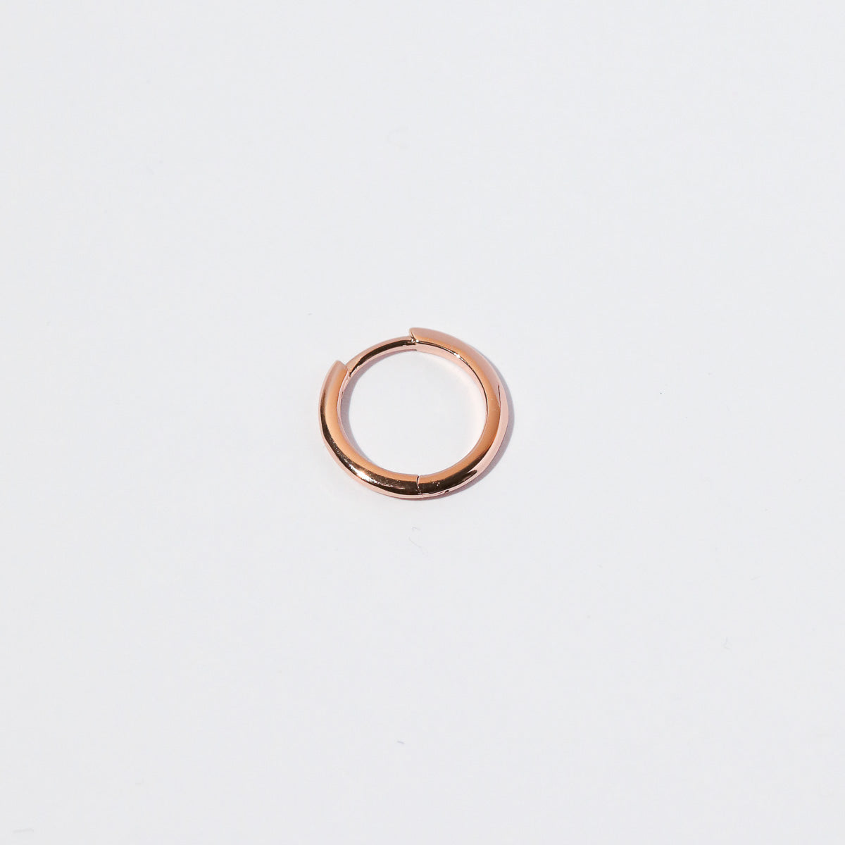 Essential 11.5mm Hoop in Rose Gold flat lay