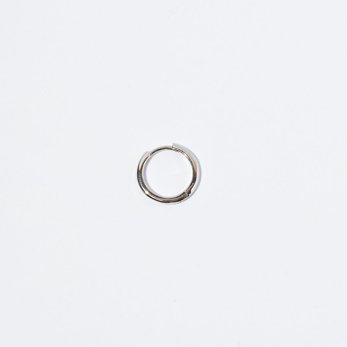 Essential 11.5mm Hoop in Silver flat lay