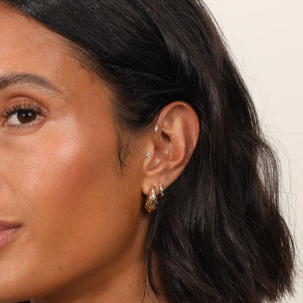 Cosmic Star Crystal Piercing Stud in Solid Gold worn