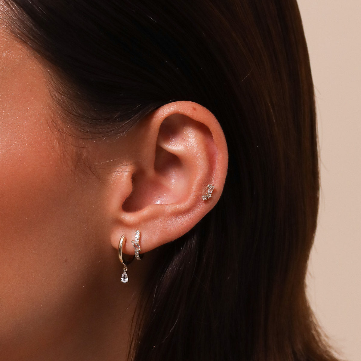 Marquise Gem Piercing Hoop in Solid Gold worn