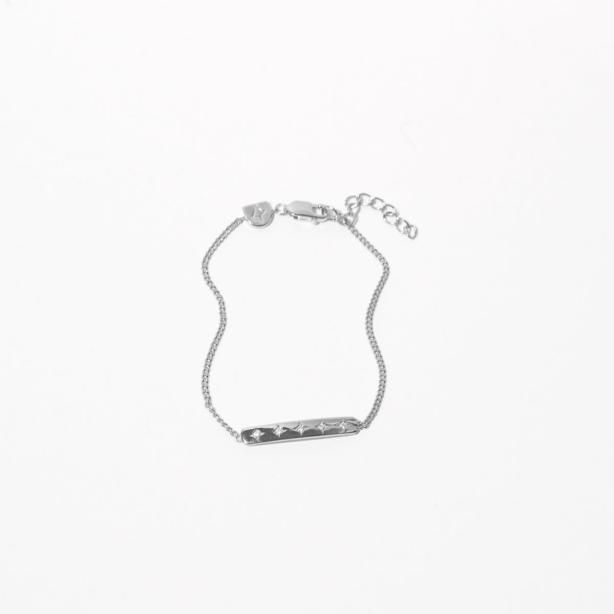 Cosmic Star Bar Bracelet in Silver flay lay