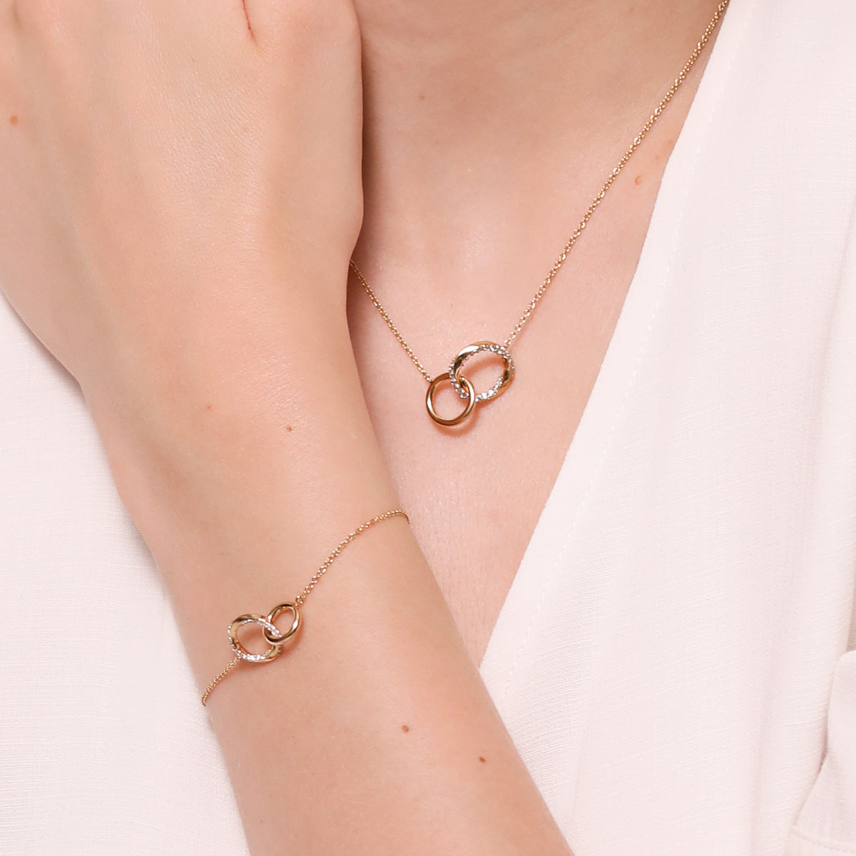Orbit Crystal Bracelet in Gold Worn with Orbit Crystal Chain Necklace in Gold