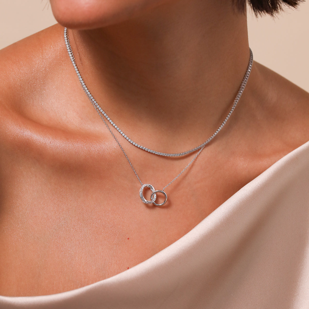 Orbit Crystal Chain Necklace in Silver worn with Tennis Necklace in Silver