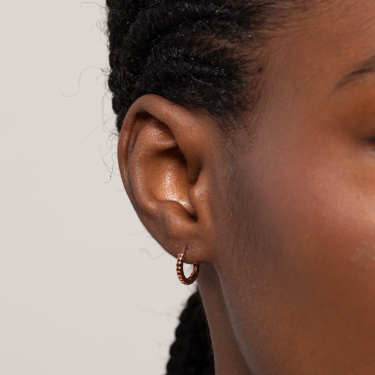 Heart Pave Charm Huggies in Rose Gold worn without charm