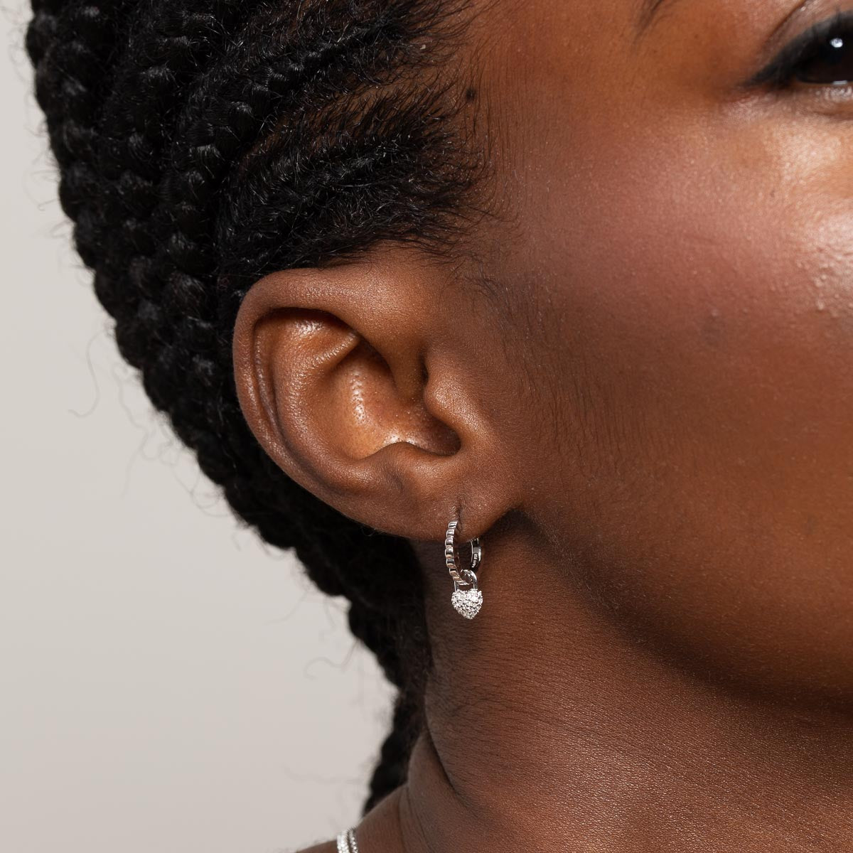 Heart Pave Charm Huggies in Silver worn