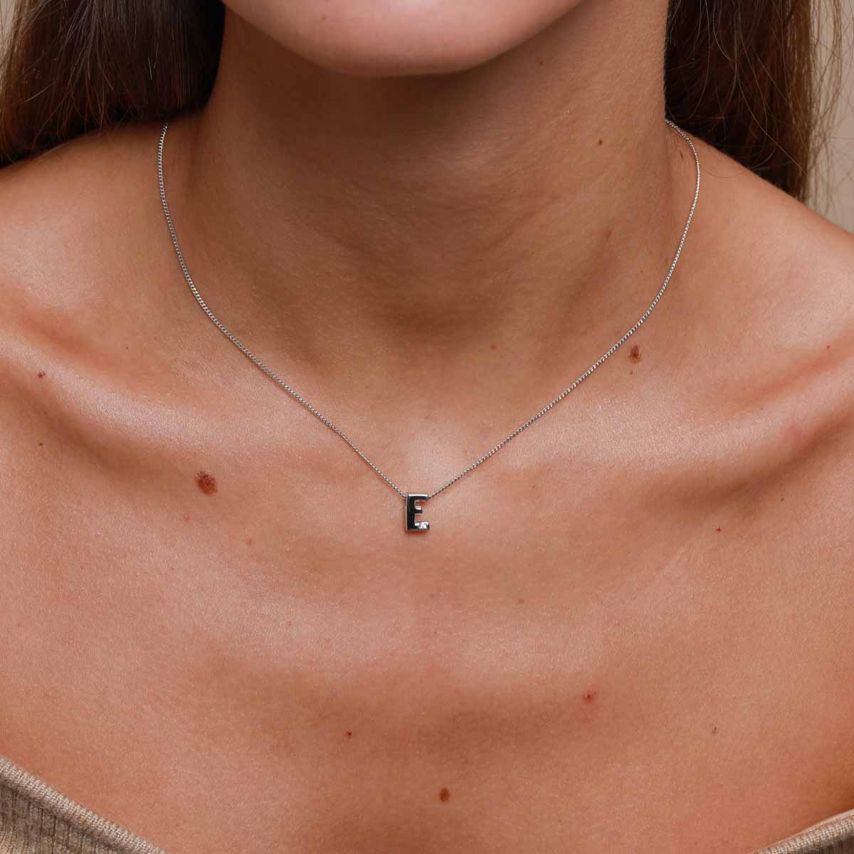 E Initial Pendant Necklace in Silver worn