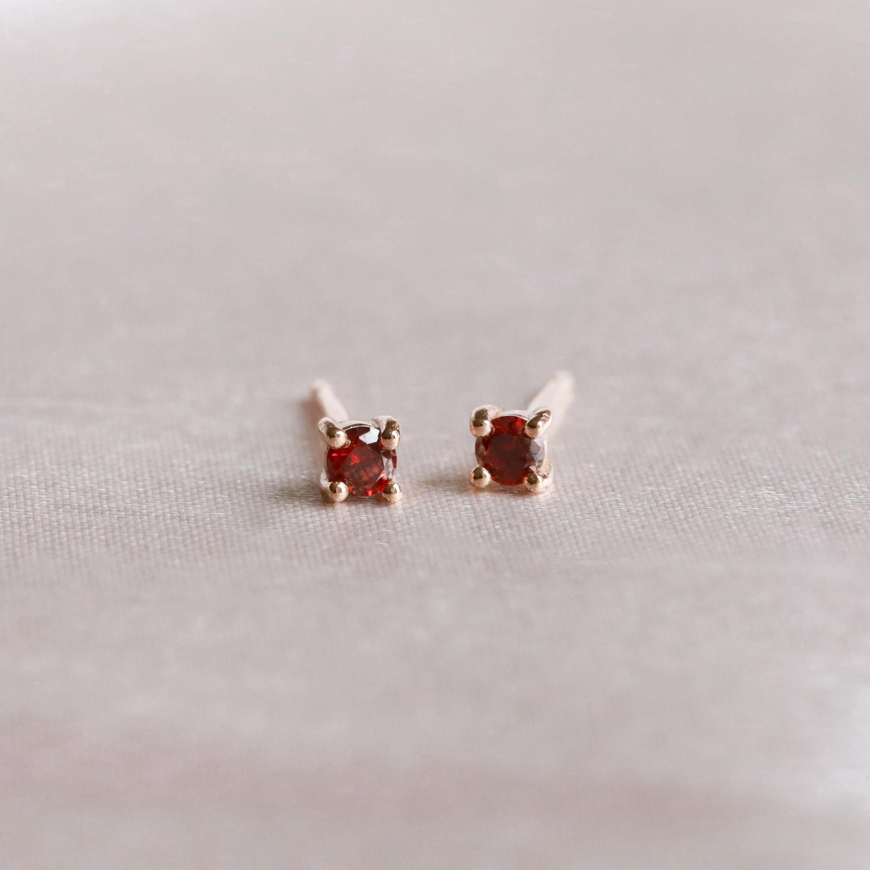 18k Gold Plated Jewellery - January Birthstone Stud Earrings in Gold with Garnet CZ - Stud Earrings - Astrid & Miyu