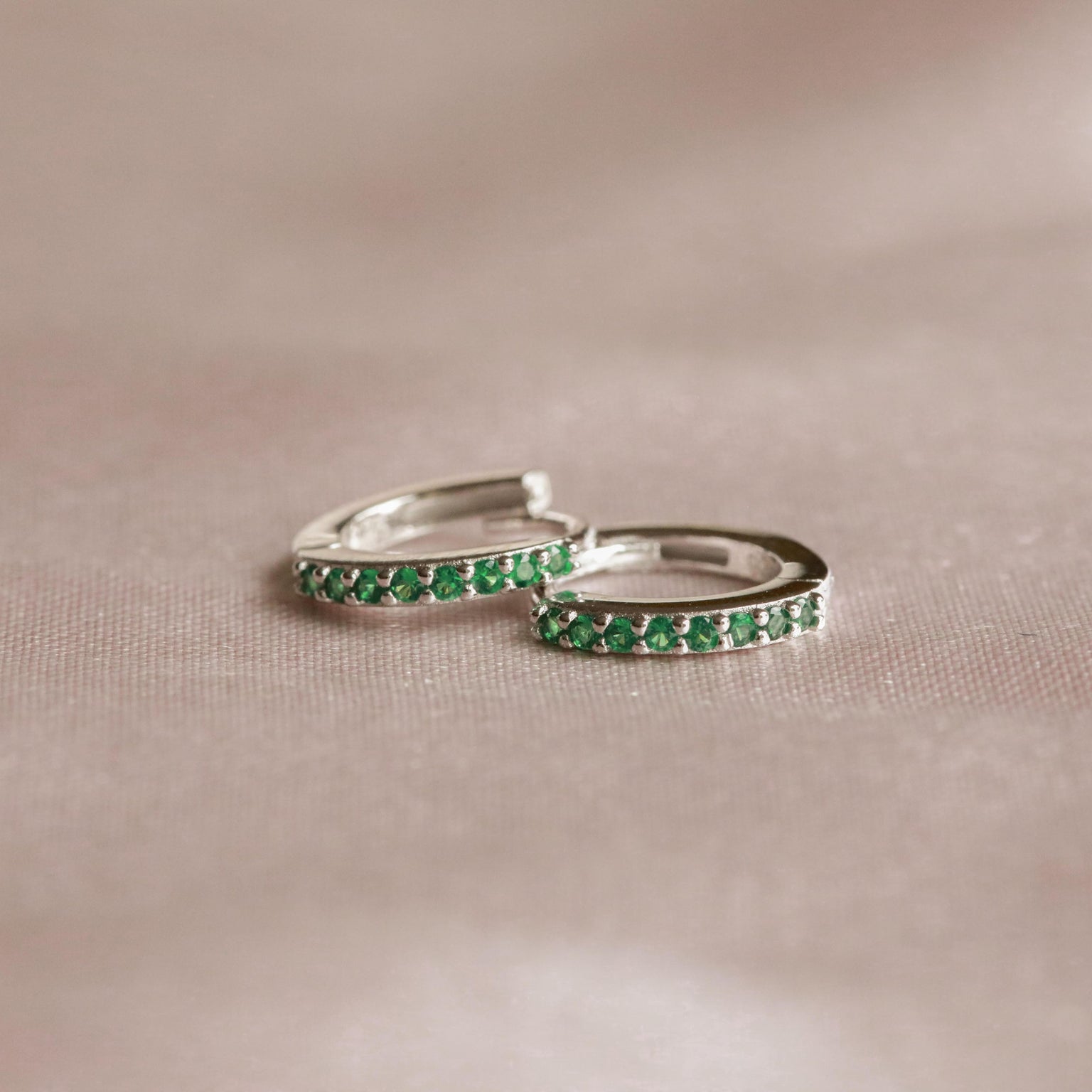 May Birthstone Huggies in Silver with Emerald CZ