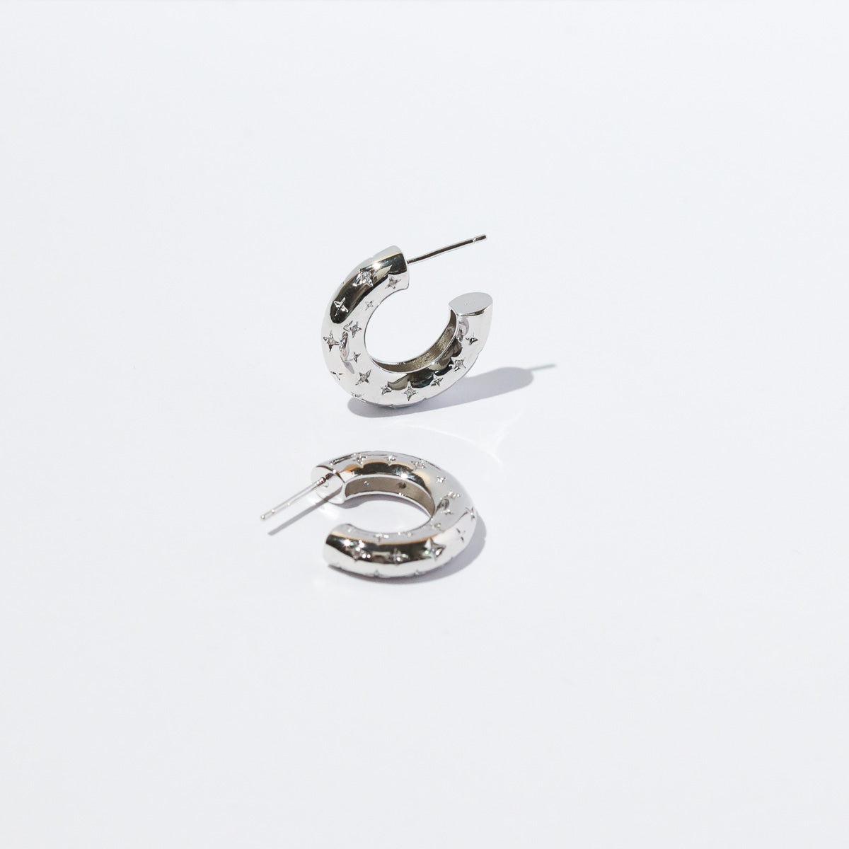 Core Collection SS23 - Cosmic Star Dome Hoops in Silver - - Astrid & Miyu