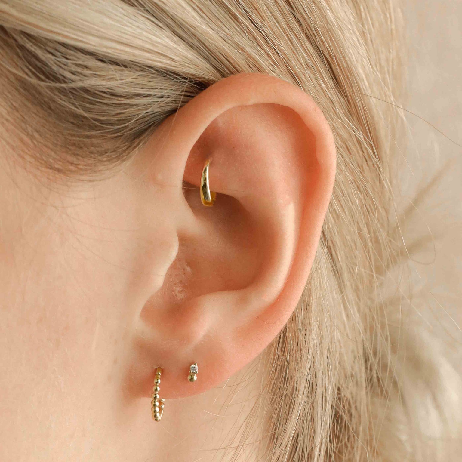 Earrings - Solid Gold Graduated Rook Hoop - Rook Piercing Hoop - Astrid & Miyu