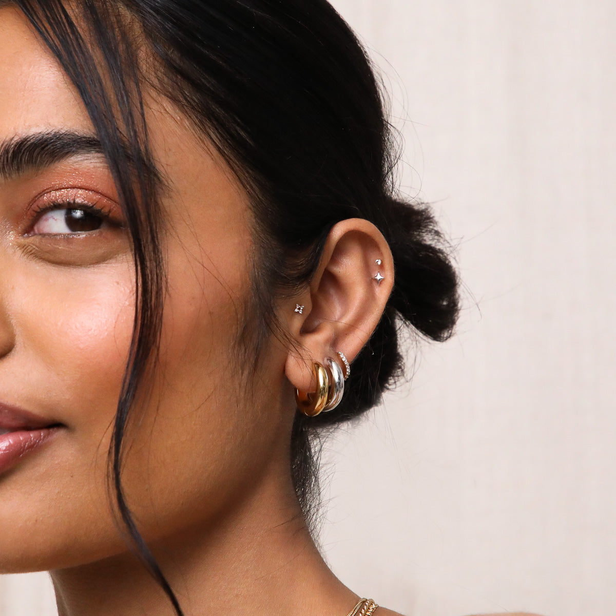 Cosmic Star Piercing Stud in Solid White Gold worn