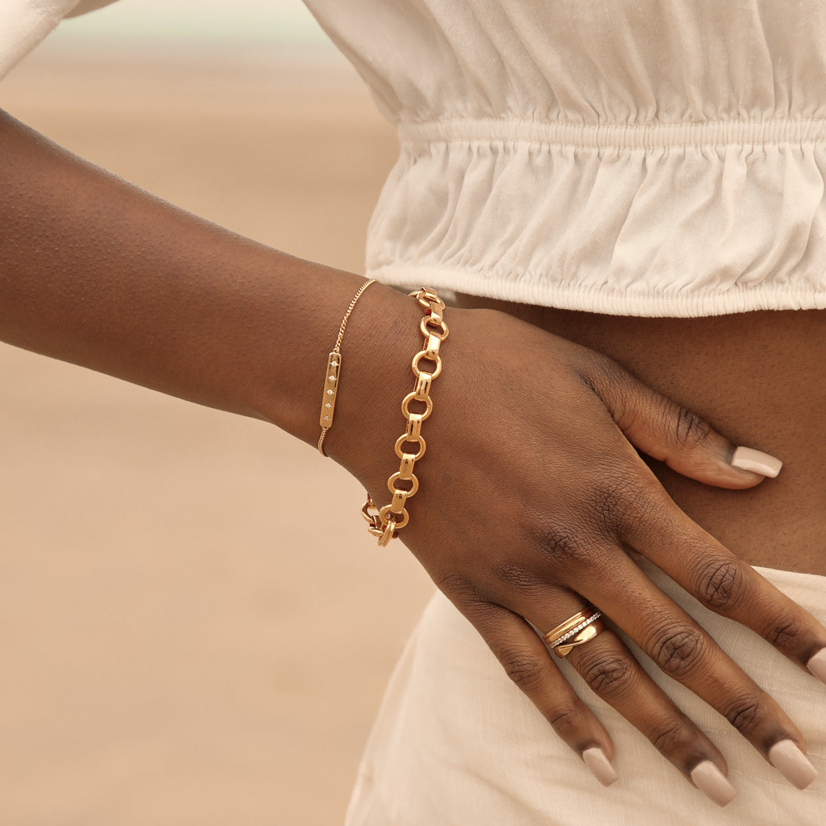 Cosmic Star Bar Bracelet in Gold worn