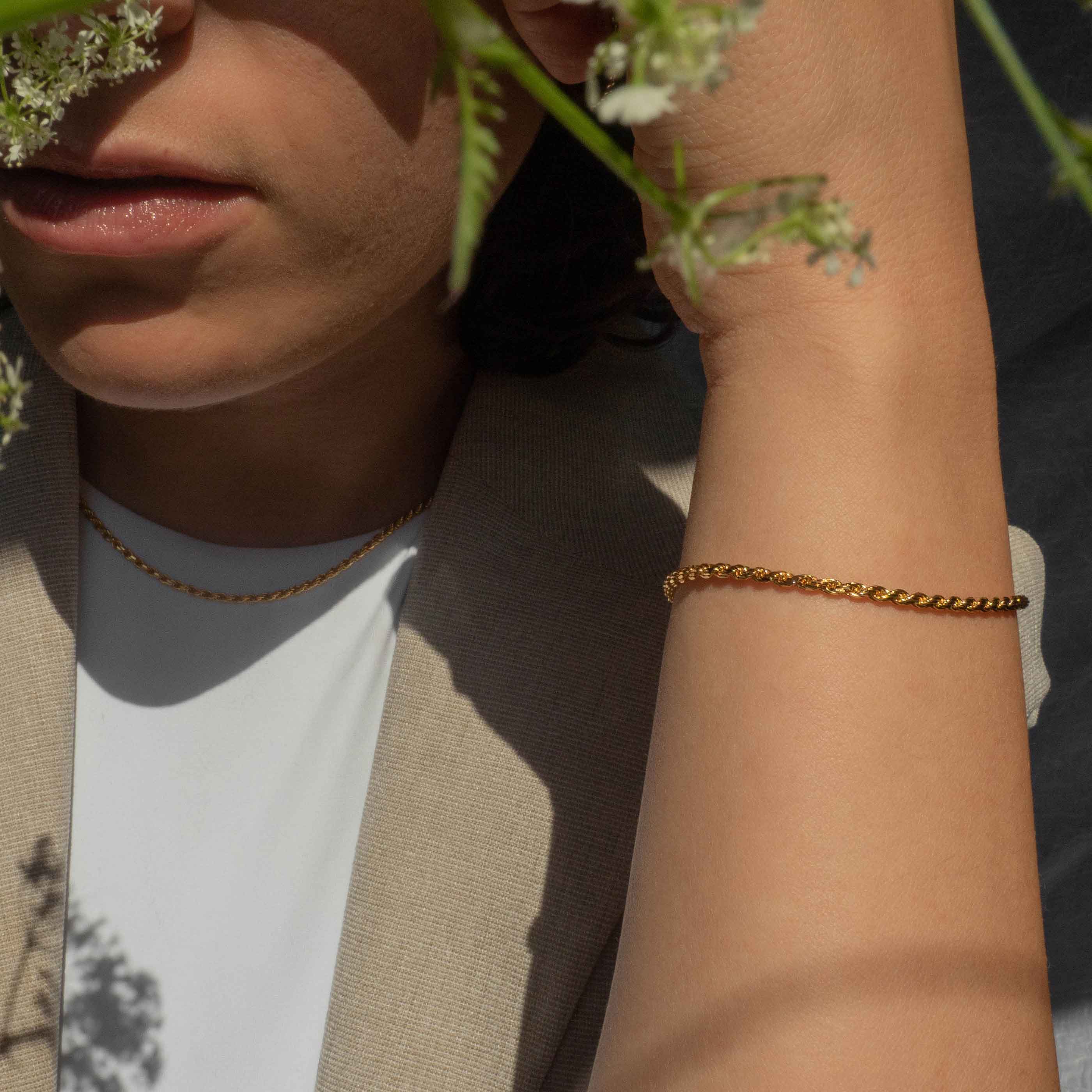 Rope Chain Bracelet in Gold worn with gold chain necklace