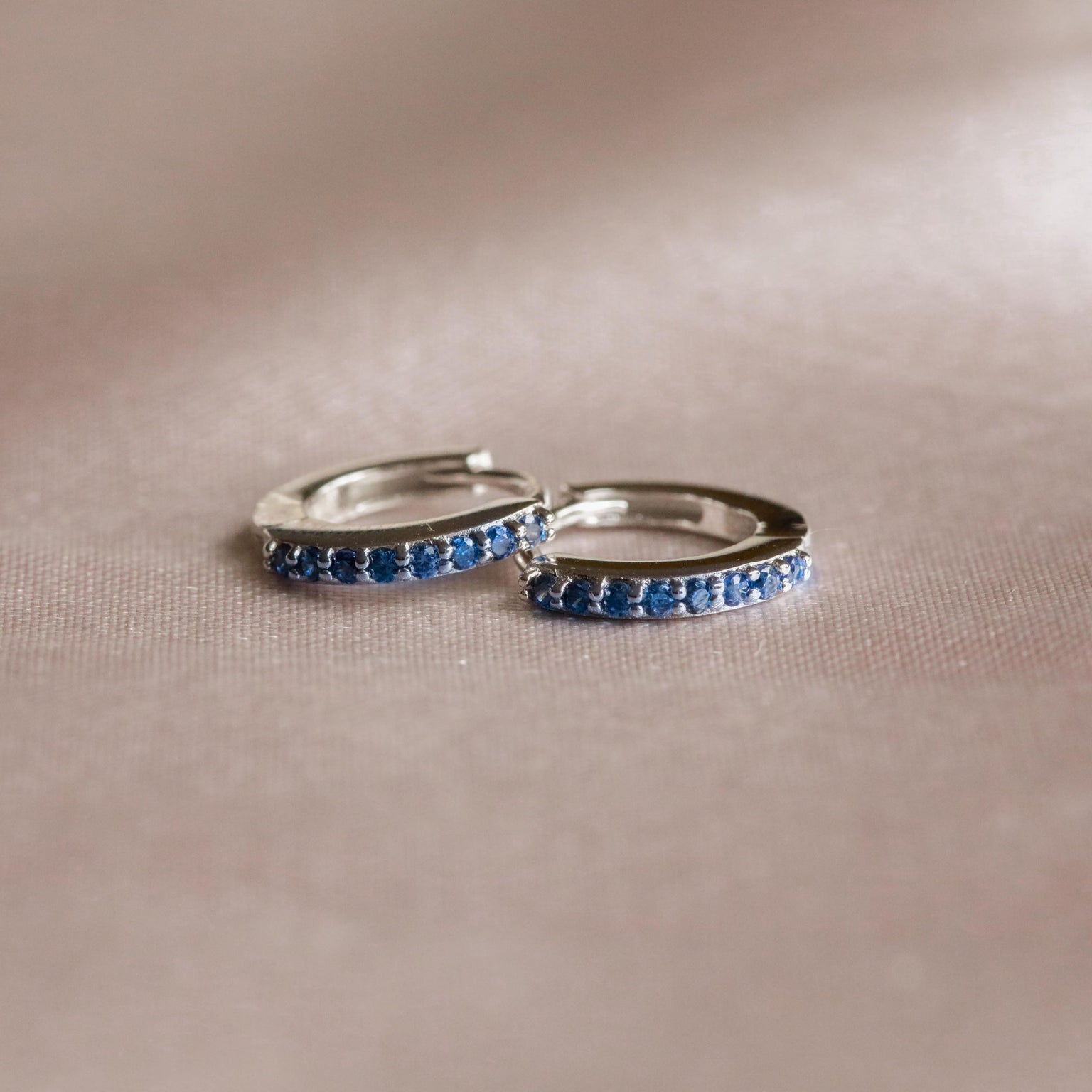 Birthstone Earrings - September Birthstone Huggies in Silver with Sapphire CZ - Huggies - Astrid & Miyu