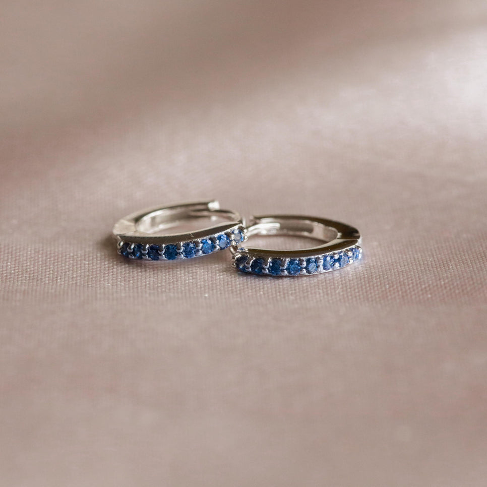 Birthstone Earrings - September Birthstone Huggies in Silver with Sapphire CZ - Huggies - Astrid & Miyu