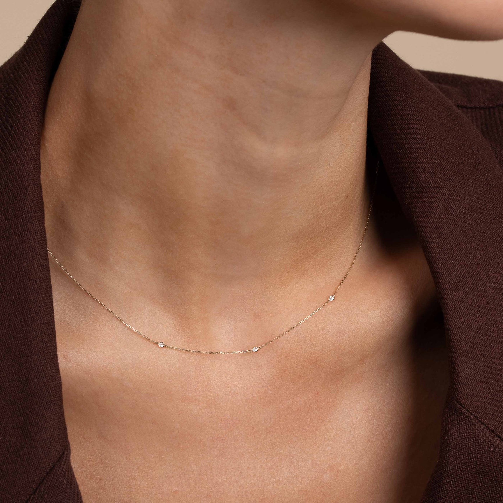 Topaz Charm Necklace in Solid Gold worn