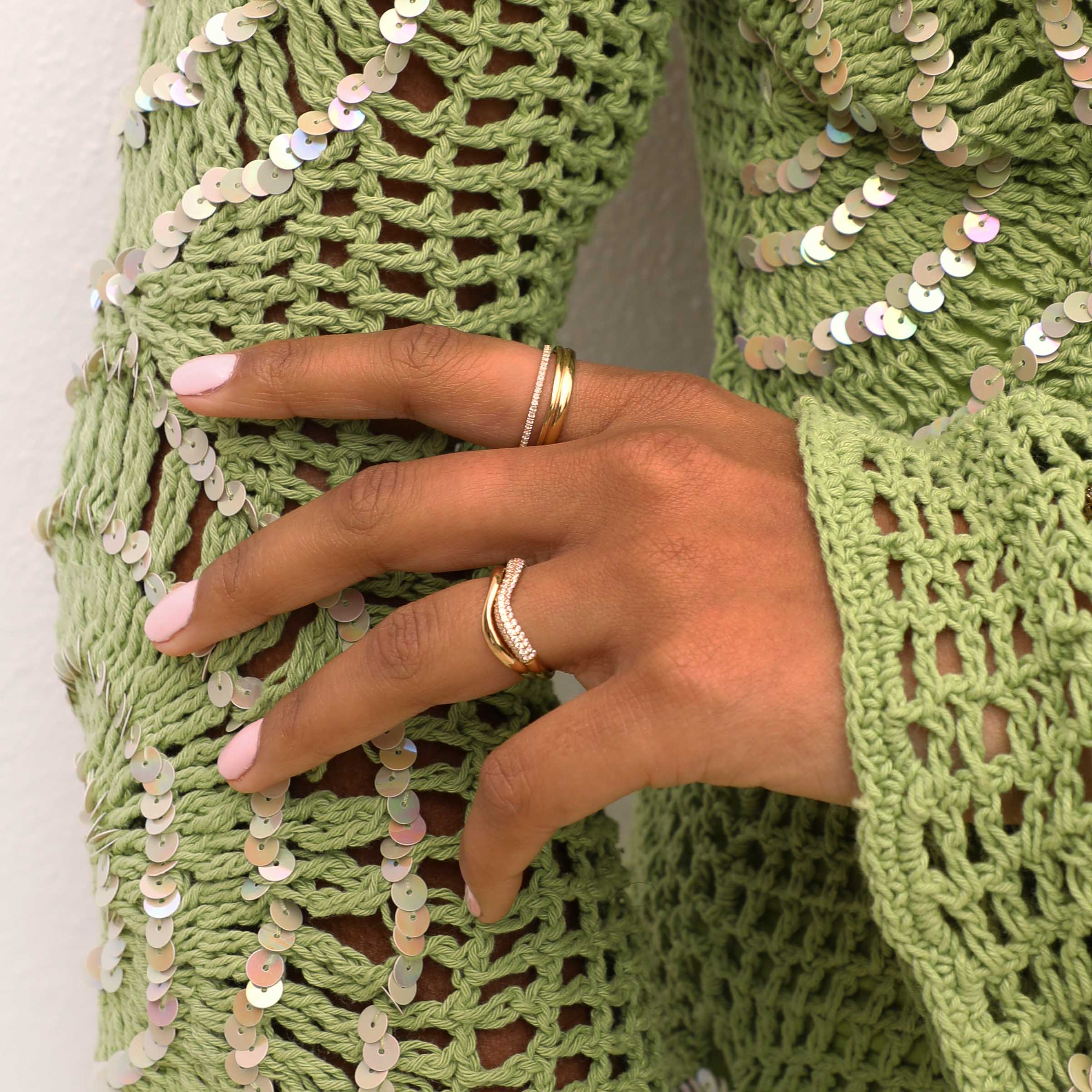 Wave Crystal Ring in Gold worn layered with other rings