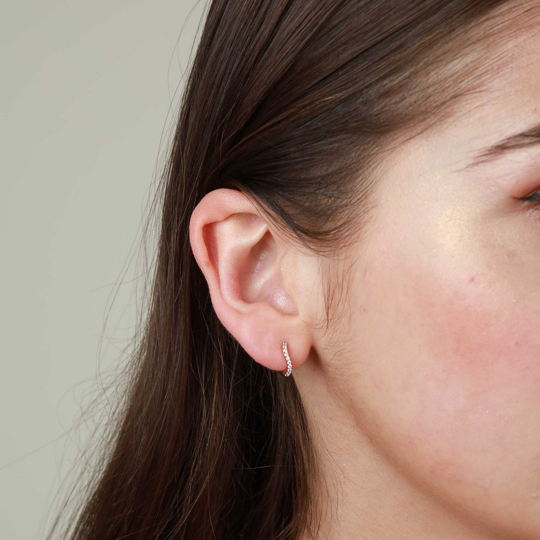 Wave Crystal Huggies in Silver worn