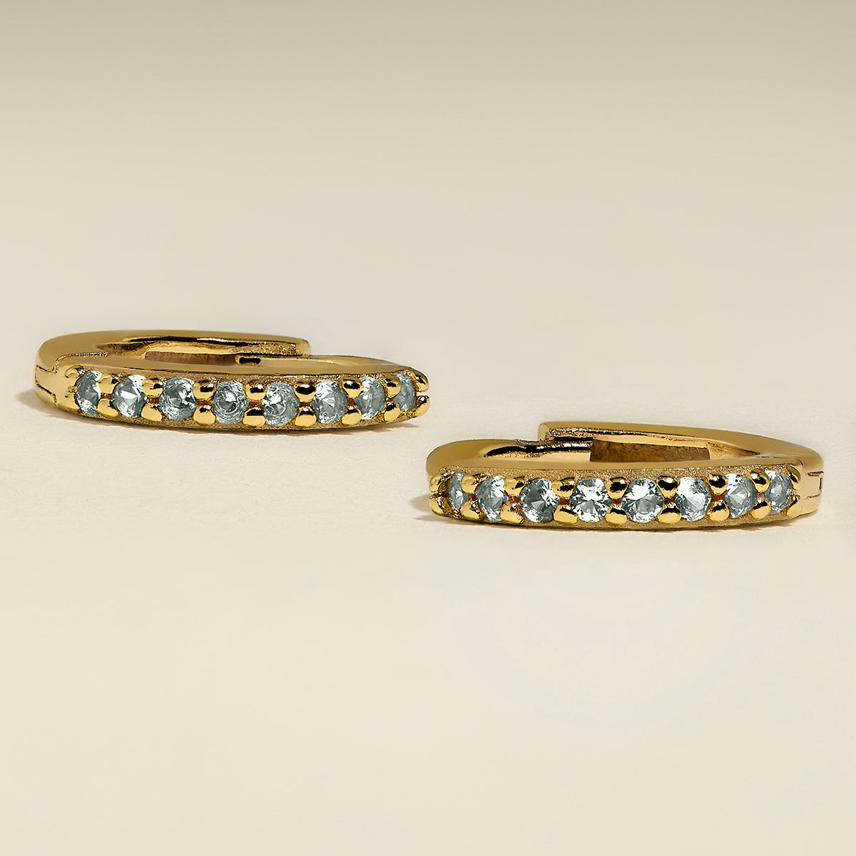 March Birthstone Huggies in Gold with Aquamarine CZ-Astrid &amp; Miyu